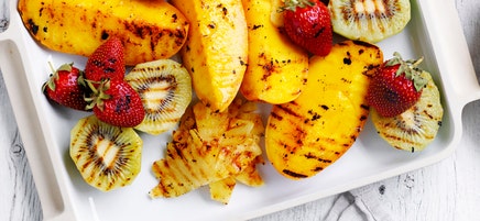 Grilled tropical fruit with lime and caramel yoghurt
