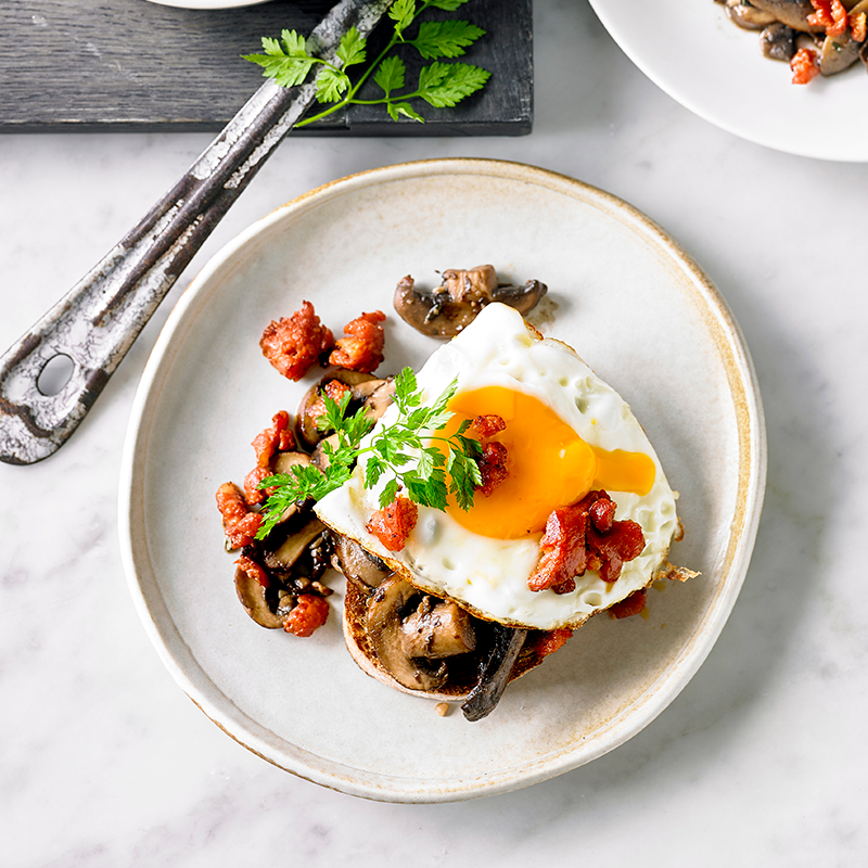 Photo of Spicy garlic mushrooms with fried egg and chorizo crumbs by WW