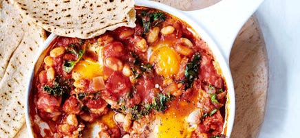 Shakshuka with white beans and kale