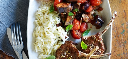 Fennel-rubbed lamb cutlets with eggplant and tomato braise