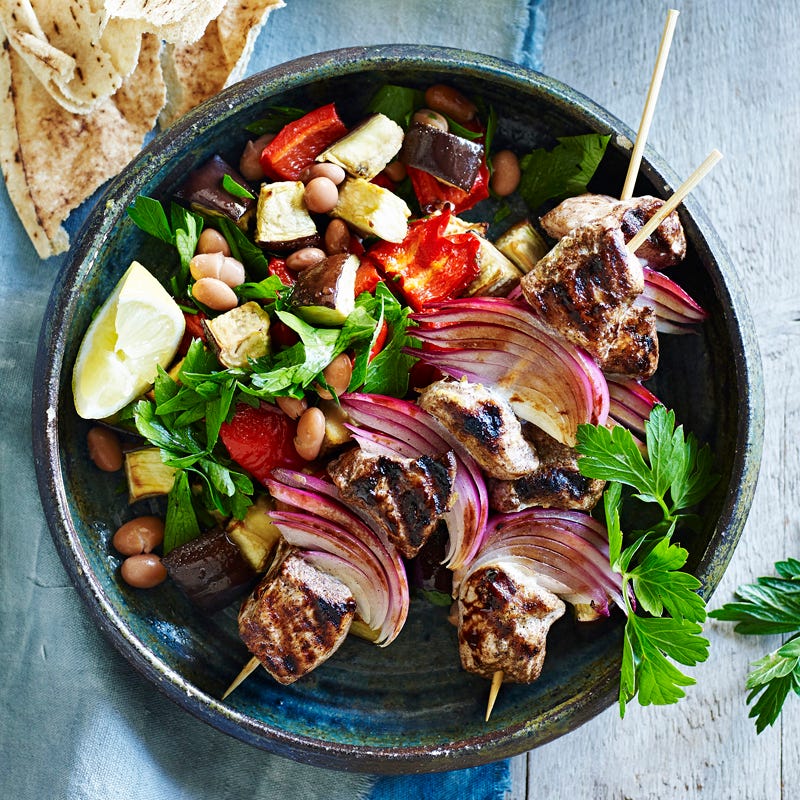 Allspice turkey skewers with eggplant salad