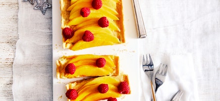 Juicy mango and passionfruit tart