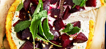 Polenta tart with beetroot, feta cream and hazelnuts