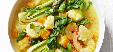 Seafood in coconut turmeric broth