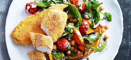 Spiced polenta chicken tenders with roasted pumpkin and chickpea salad