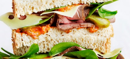 Rare roast beef sandwiches with pecan romesco
