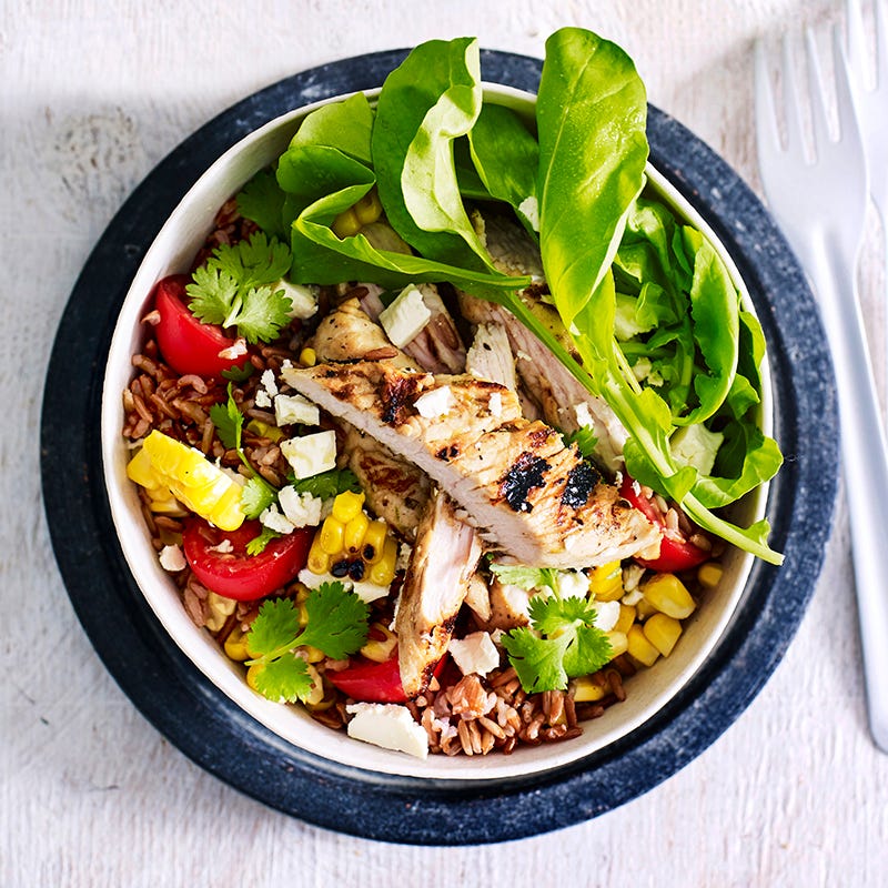 Photo of Red rice bowl with grilled corn, lime and garlic turkey and feta by WW