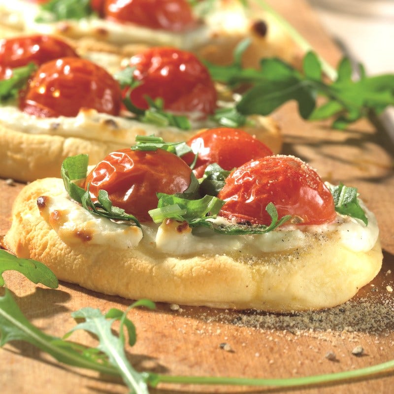 Photo de Pizzas à la crème de feta et roquette prise par WW