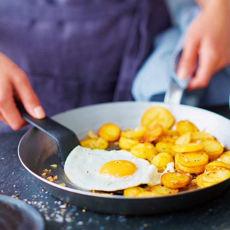 Foto van Gebakken aardappelen met spiegelei door WW