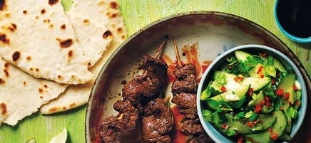 Fragrant beef skewers with roti