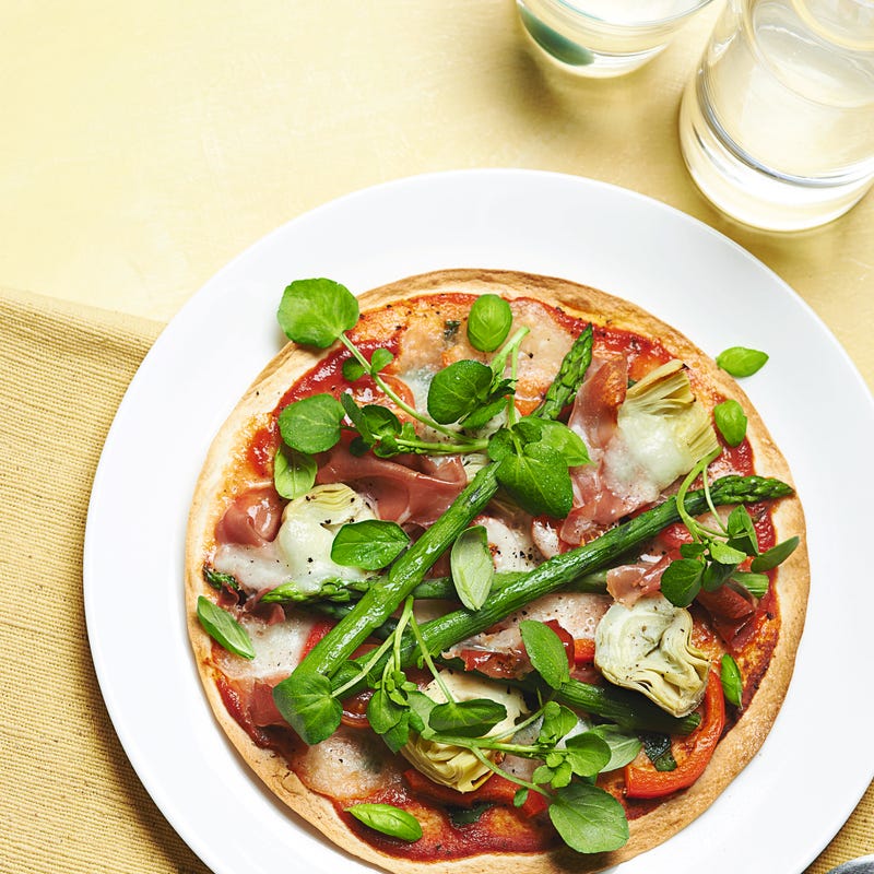 Photo of Super quick asparagus, artichoke & prosciutto pizza by WW