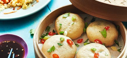 Steamed pork buns with spicy salad