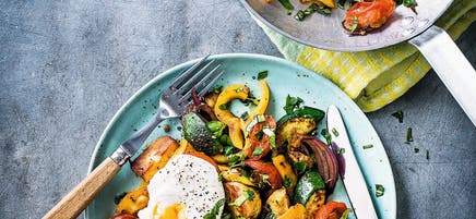 Veggie hash with poached eggs