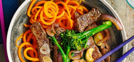 Spicy stir-fried beef & broccoli with carrot noodles