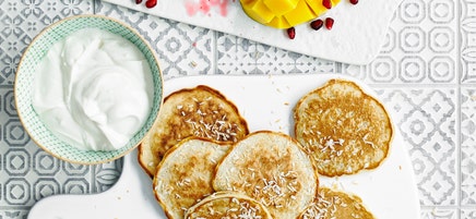 Coconut pancakes with tropical fruit