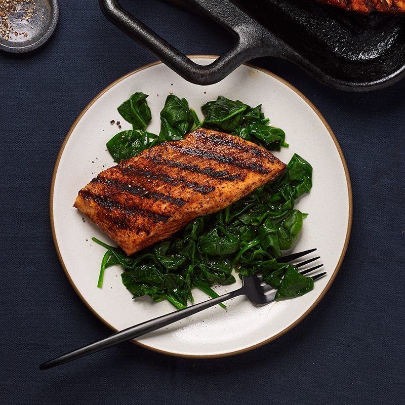 Photo of Spice-crusted salmon over spinach by WW