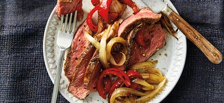 Grilled Rib Eye Steaks with Roasted Peppers & Onions