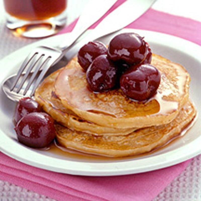 Photo of Oatmeal-buttermilk pancakes topped with cherries by WW