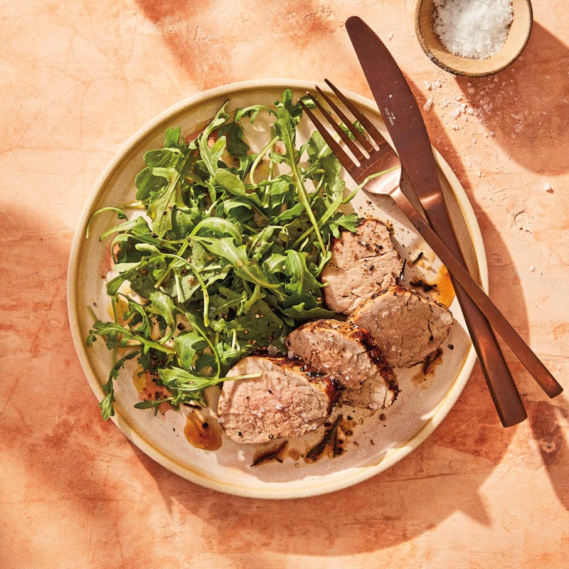 Grilled rosemary-garlic pork loin with arugula