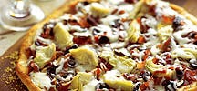 Pizza quattro stagioni (four seasons)