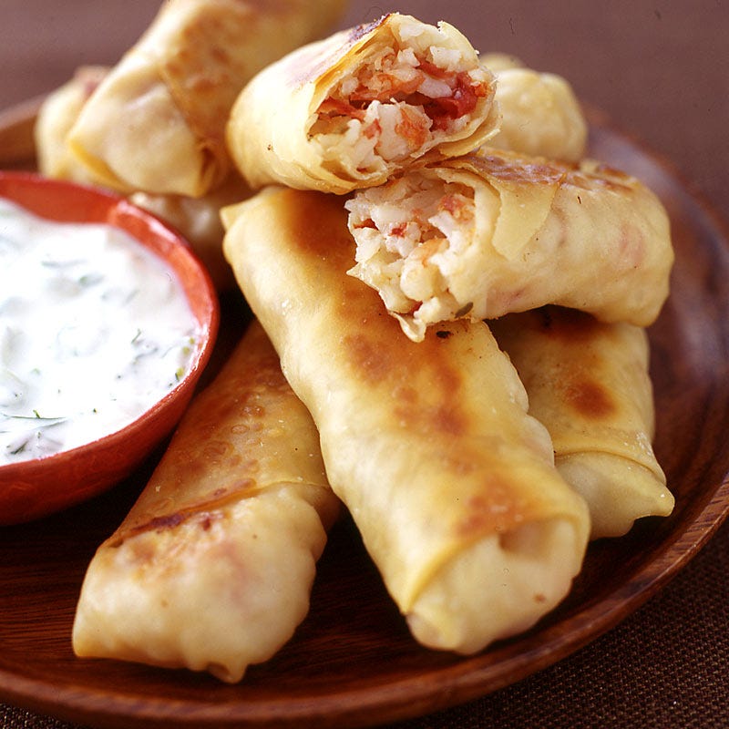 Photo of Greek-style egg rolls with a garlic-dill dipping sauce by WW