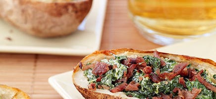 Baked potato skins with creamy spinach and turkey bacon