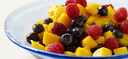 Mango berry salad with ginger glaze