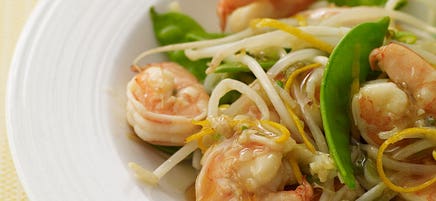 Stir-fried shrimp and snow peas in orange sauce