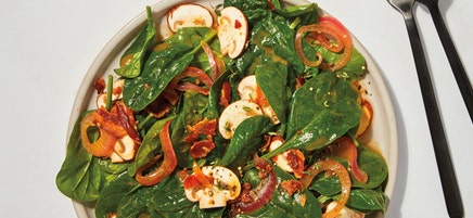 Spinach, mushroom & bacon salad with warm onion dressing