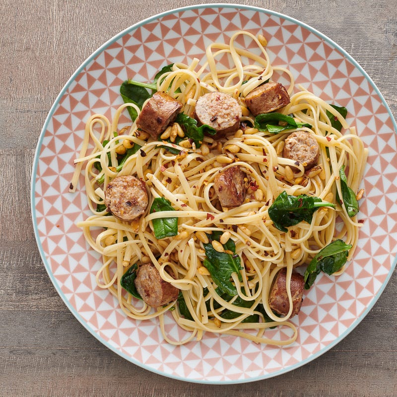 Photo of Pasta with sausage, spinach, and pine nuts by WW