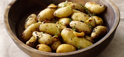 Grilled fingerling potatoes with lemon and fresh herbs
