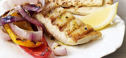 Halibut, peppers, and onions with lemon and oregano