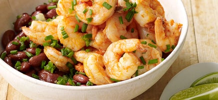 Shrimp over cumin-scented beans