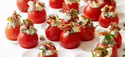 Cherry tomatoes stuffed with blue cheese and bacon