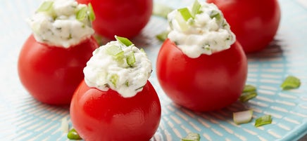 Cherry tomatoes stuffed with creamy feta and cucumber