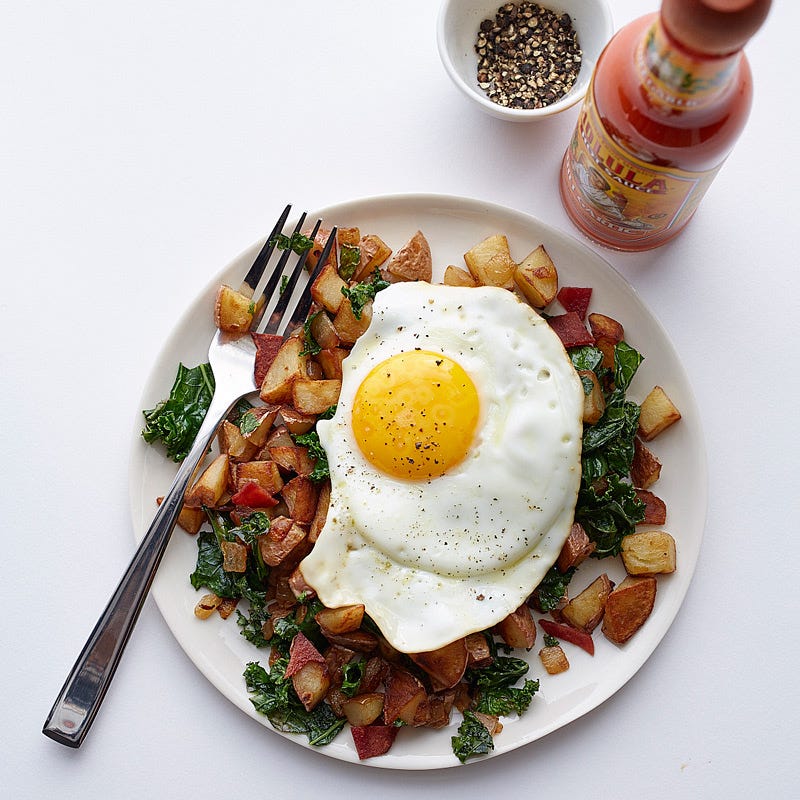 Photo of Egg over red potato, kale & bacon hash by WW