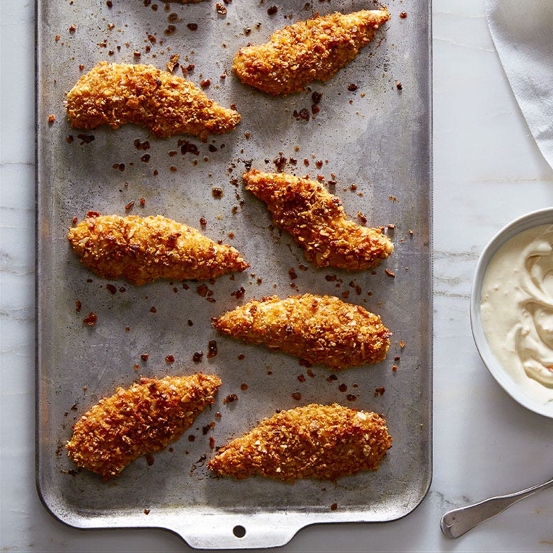 Photo of Crunchy Almond & Oat Chicken Fingers with Yogurt-Dijon Dipping Sauce by WW