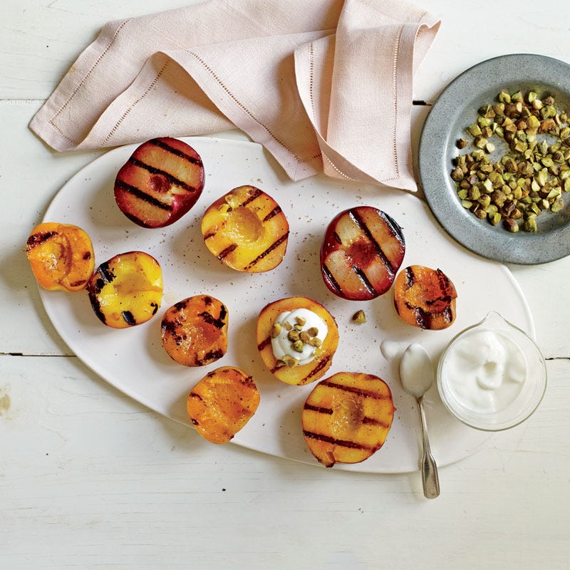 Grilled stone fruit with honey yogurt and pistachios