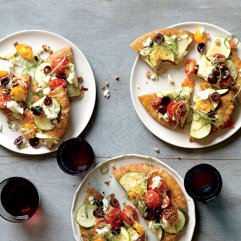 Photo of Zucchini and Tomato Pita Pizzas by WW