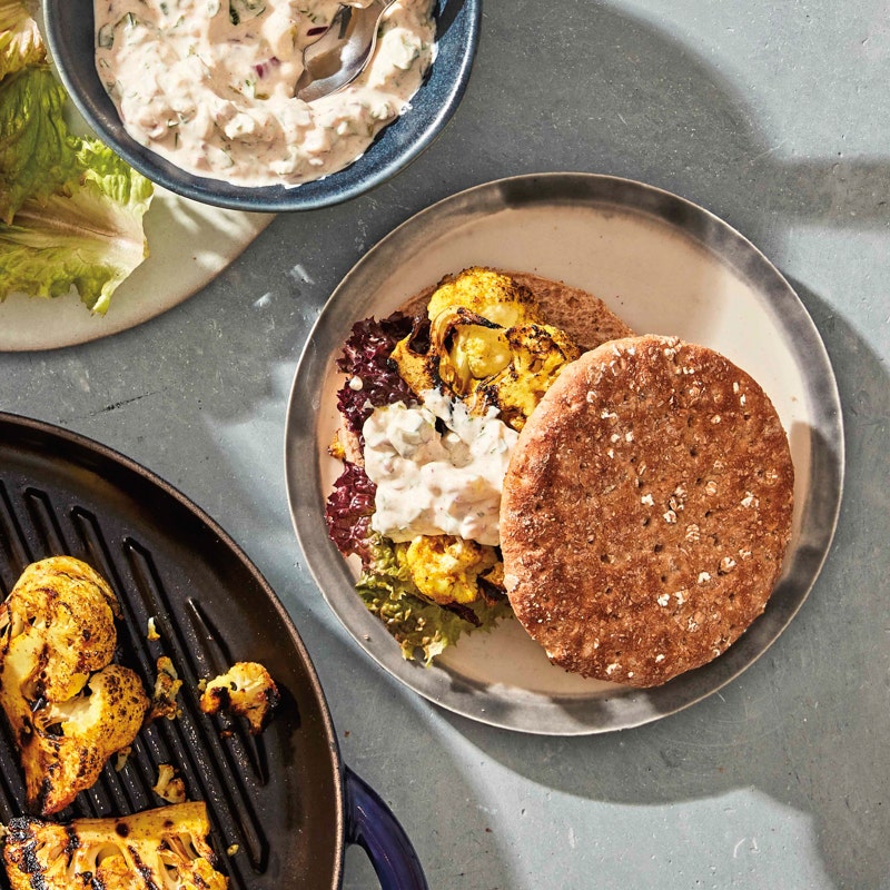 Grilled curried cauliflower burgers with cucumber raita