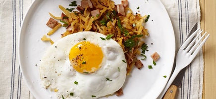 Jicama-ham hash browns with fried eggs