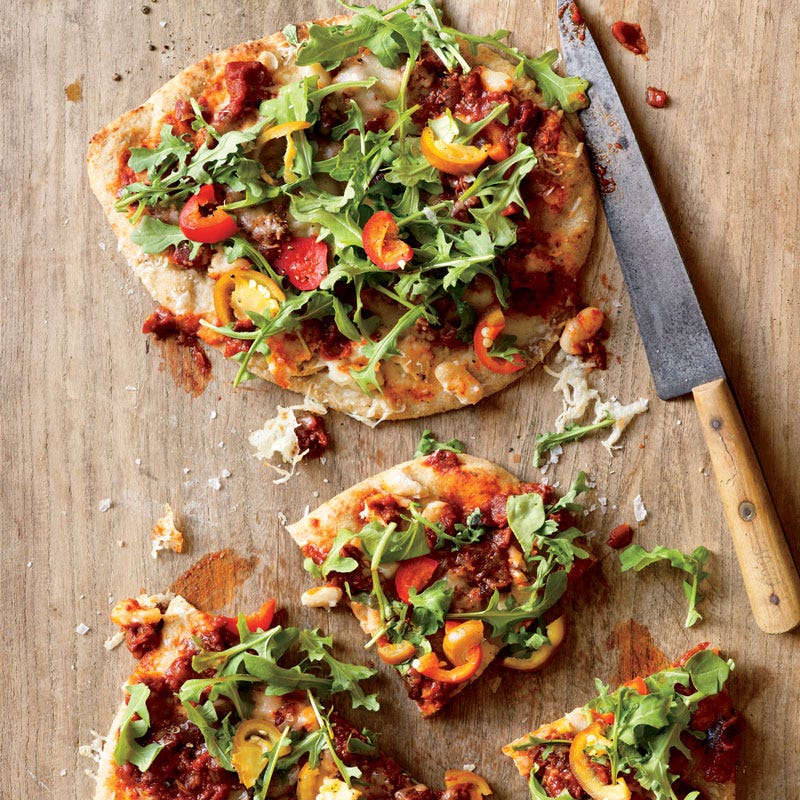 Photo of Spicy white bean, caponata, and arugula pizzas by WW