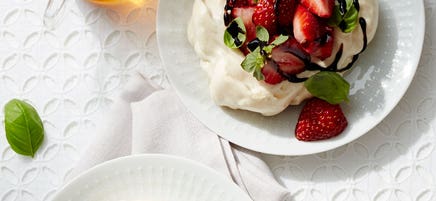 Vanilla-basil meringue nests with strawberries