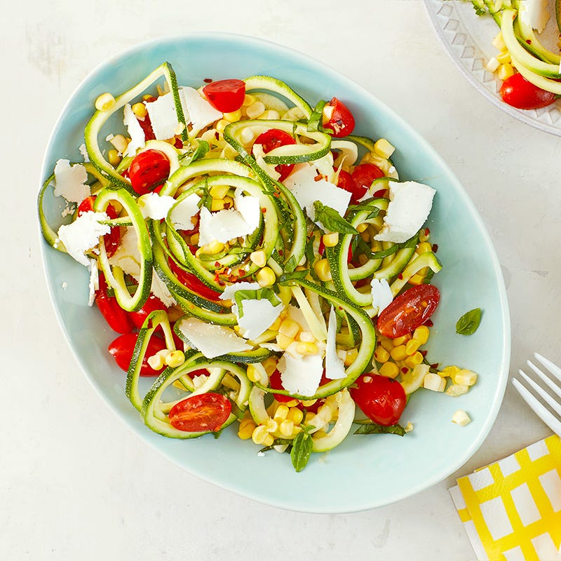 Photo of Zucchini noodle salad with tomatoes, corn, and basil by WW