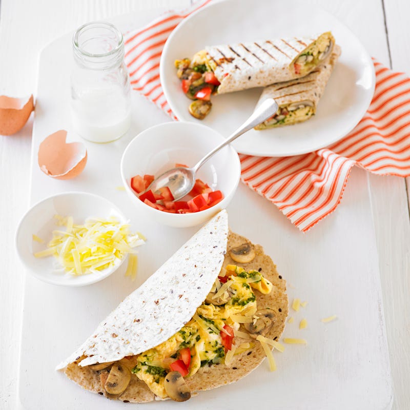 Breakfast wrap with pesto scrambled eggs