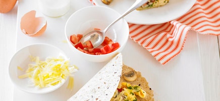 Breakfast wrap with pesto scrambled eggs