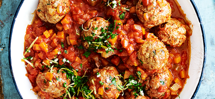 Pork and veal meatballs on polenta with gremolata