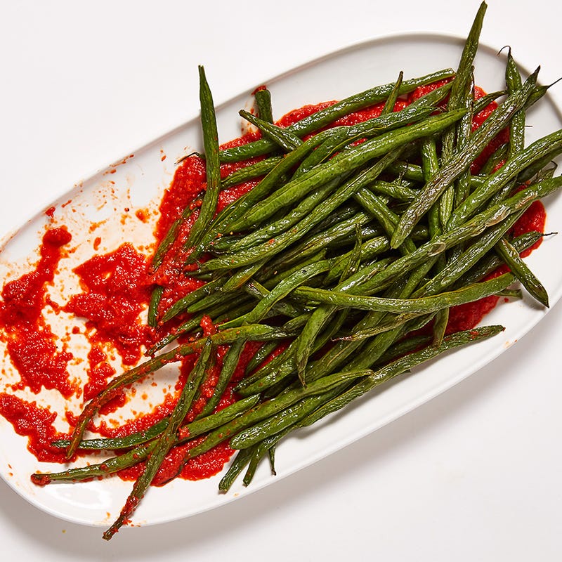 Roasted green beans with red pepper sauce