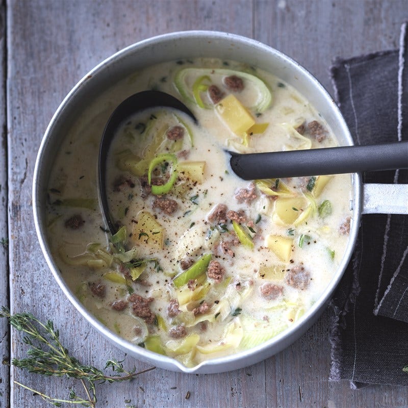 Preisoep met smeerkaas en americain