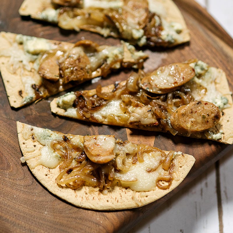 Photo of Caramelized Onion, Blue Cheese, and Turkey Sausage Pizza by WW